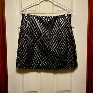 Black and silver mini skirt